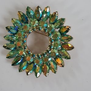 Gorgeous vintage crystal greens circle brooch